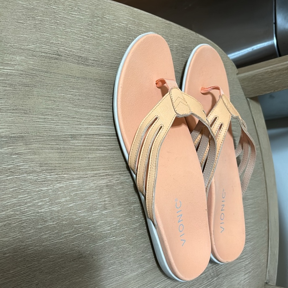 Vionic orange Flip flops size 7.
Sample pair no box 10 inches length
A-2 - Picture 3 of 5